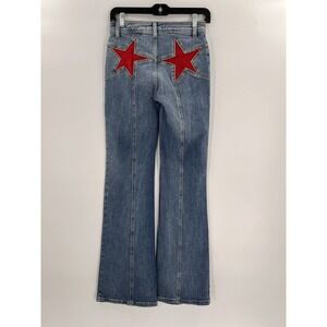 Free People Blue Flare Jeans with Red Star Accents